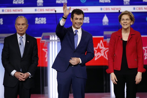 From left, Democratic presidential candidates, former New York City Mayor Mike Bloomberg, former South Bend Mayor Pete Buttigieg, and Sen. Elizabeth Warren, D-Mass., stand on stage before a Democratic ...