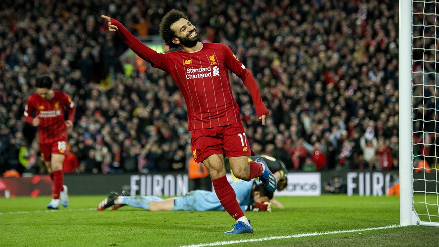 epa08185645 Liverpool&#039;s Mohamed Salah celebrates after scoring the fourth goal during the English Premier League soccer match between Liverpool and Southampton at Anfield, Liverpool, Britain, 01  ...