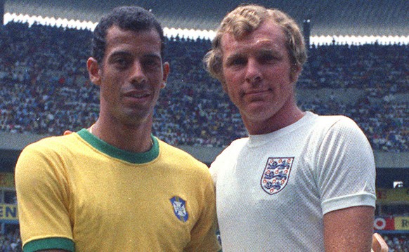 ** FILE ** Brazil&#039;s captain Carlos Alberto, left, and England&#039;s captain Booby Moore, prior to their World Cup match in the Jalisco Stadium in Mexico, June 7 1970 the last time the two countr ...