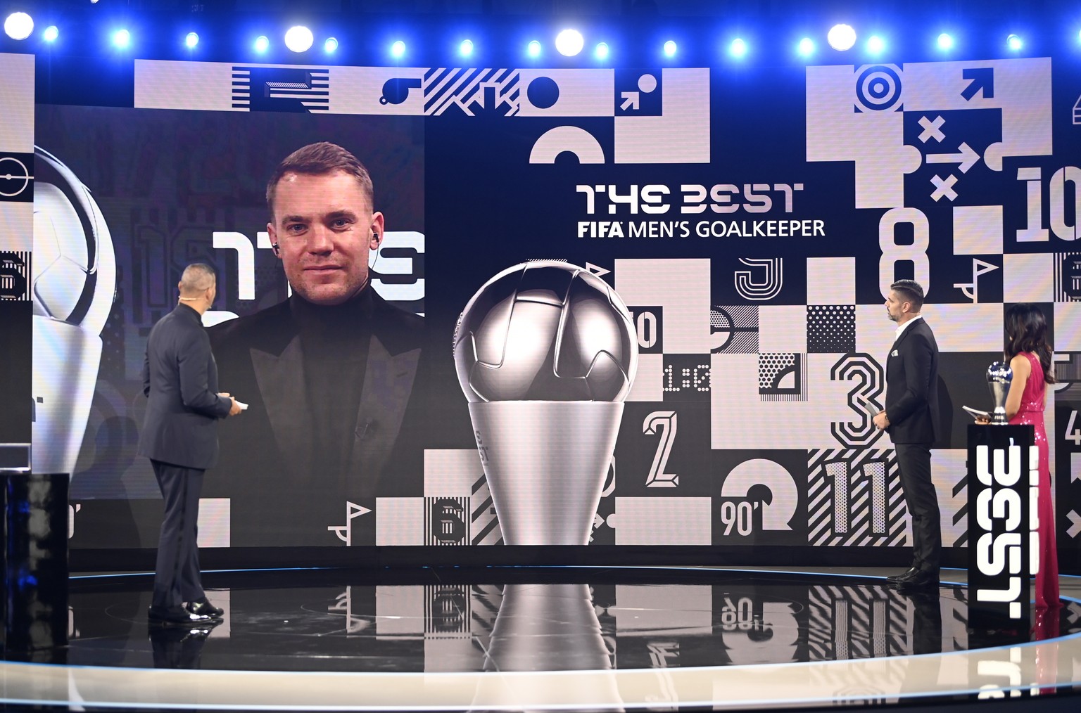epa08890340 Bayern Munich goalkeeper Manuel Neuer appears on screen to give an acceptance speech after receiving The Best FIFA Men&#039;s goalkeeper award during the Best FIFA Football Awards virtual  ...