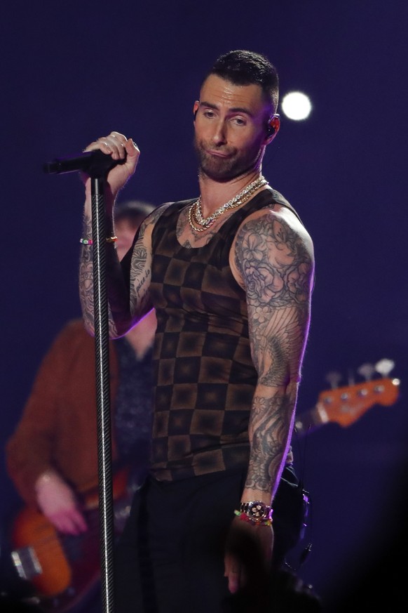 epa07341556 Maroon 5&#039;s Adam Levine performs during the half time show of Super Bowl LIII between the New England Patriots and the Los Angeles Rams at Mercedes-Benz Stadium in Atlanta, Georgia, US ...
