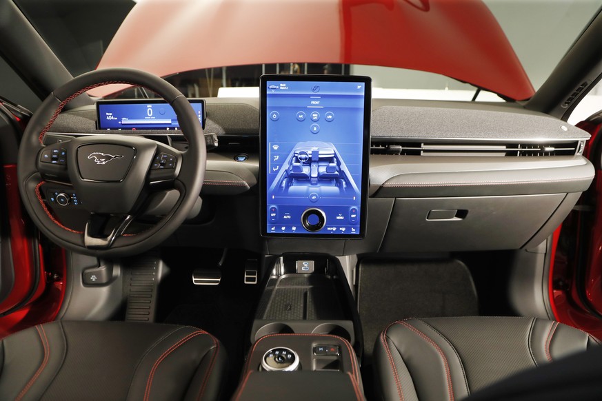 This Wednesday, Oct. 30, 2019 photo, shows the interior of the new Ford Mustang Mach-E SUV in Warren, Mich. Ford is hoping to score big with the electric SUV for daily drivers that sort of looks like  ...