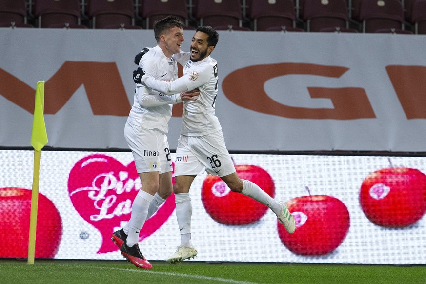 Zurich&#039;s defender Fabian Rohner, left, celebrates his goal with teammate midfielder Salim Khelifi, right, after scoring the 0:1, during the Super League soccer match of Swiss Championship between ...
