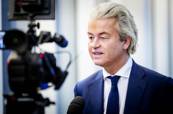 epa07272914 Geert Wilders talks with journalists after the ruling in the extra secure court at Schiphol Airport, The Netherlands, 10 January 2019. The court ruled that the trial against Wilders for hi ...