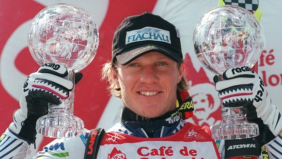 Hermann Maier of Austria holds his two cristal globes, the winner trophies for his victories of the overall men&#039;s super-G and giant slalom, in Crans-Montana, Switzerland, on March 14, 1998. (KEYS ...