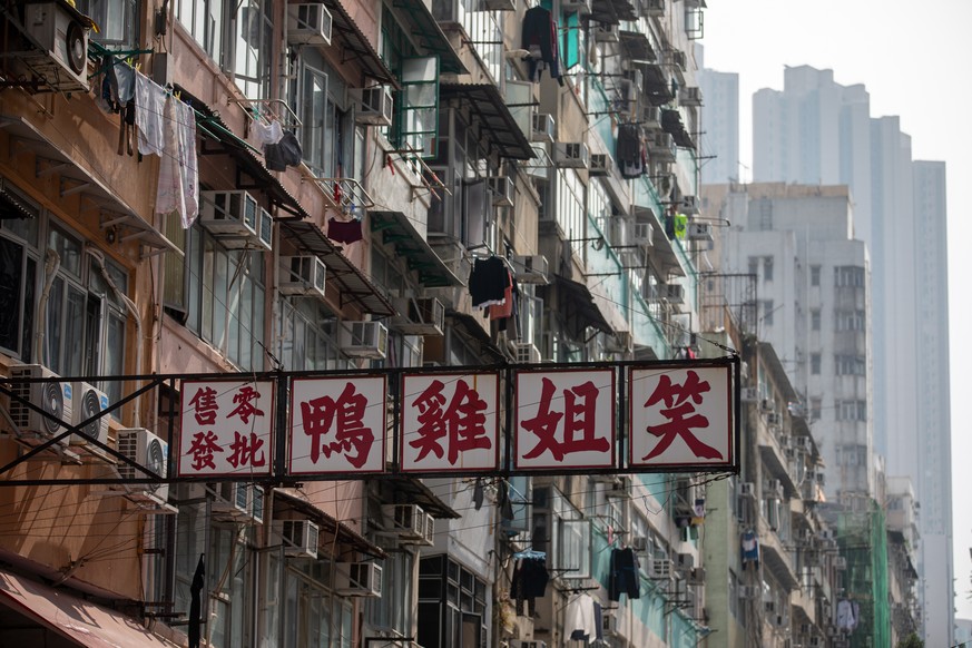 epa08956957 An old tenement building sits in Jordan district in Hong Kong, China, 22 January 2021. The Hong Kong government will place tens of thousands in lockdown in the districts of Jordan and Yau  ...