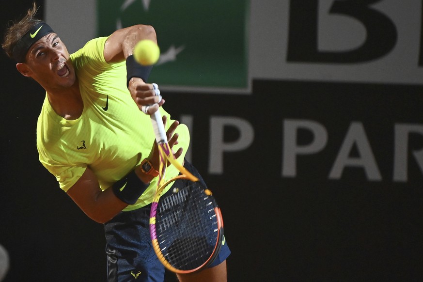 Spain&#039;s Rafael Nadal serves the ball to Serbia&#039;s Dusan Lajovic during their Italian Open tennis tournament match, in Rome, Friday, Sept. 18, 2020. (Alfredo Falcone/LaPresse via AP)