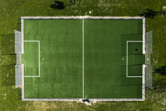 Empty Synthetic football pitch is pictured without player while it is closed due to the state of emergency of the coronavirus disease (COVID-19) outbreak, in Yverdon-les-Bains, Switzerland, Wednesday, ...