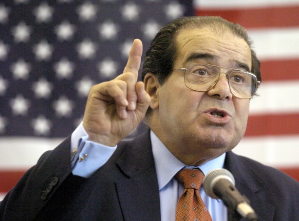 FILE - In this Wednesday, April 7, 2004 file photo, U.S. Supreme Court Justice Antonin Scalia speaks to Presbyterian Christian High School students in Hattiesburg, Miss. On Saturday, Feb. 13, 2016, th ...