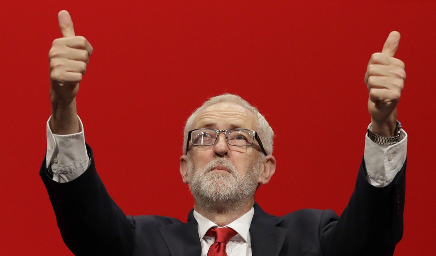 Jeremy Corbyn, leader of Britain&#039;s opposition Labour Party gives thumbs up after he addressed party members during the Labour Party Conference at the Brighton Centre in Brighton, England, Tuesday ...