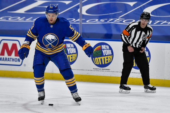 Buffalo Sabres left wing Jeff Skinner (53) looks to make a play on the puck after losing his stick, as official Conor O&#039;Donnell watches during the second period of the Sabres&#039; NHL hockey gam ...