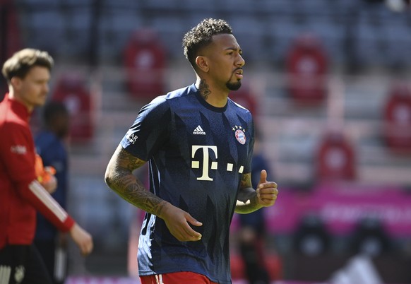 Bayern&#039;s Jerome Boateng warms up before the German Bundesliga soccer match between Bayern Munich and FC Union Berlin at Allianz Arena in Munich, Germany, Saturday, April 10, 2021.(Sven Hoppe/Pool ...