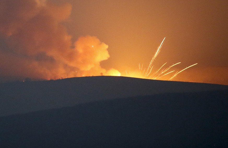 Explosions are seen in the mountains during fighting between Armenian and Azerbaijan&#039;s forces during a military conflict outside Stepanakert, the separatist region of Nagorno-Karabakh, Sunday, No ...