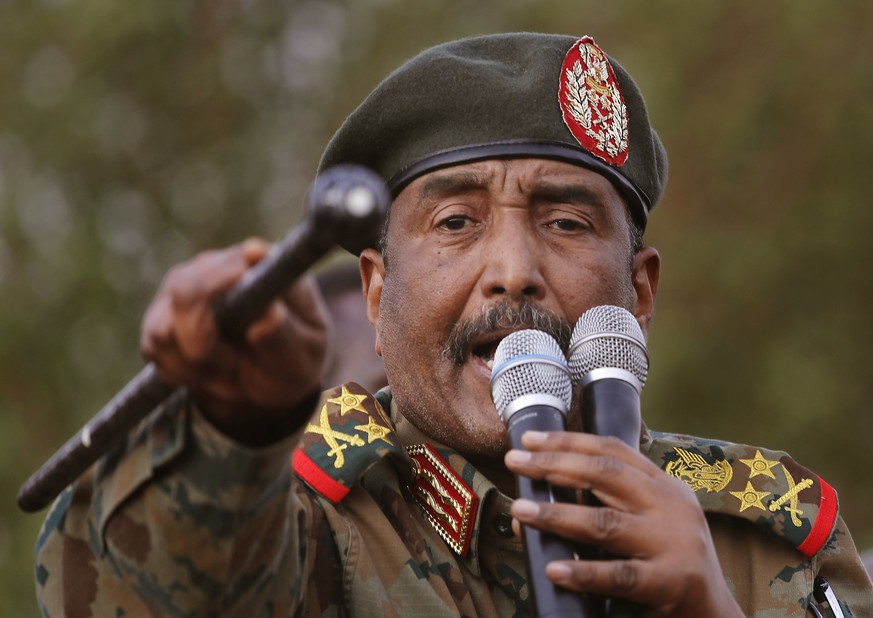 FILE - In this June 29, 2019 file photo, Sudanese Gen. Abdel-Fattah Burhan, head of the military council, speaks during a military-backed rally, in Omdurman district, west of Khartoum, Sudan. Official ...