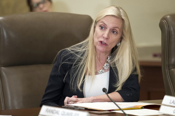 FILE- In this June 14, 2018, file photo Federal Reserve Board Governor Lael Brainard participates in an open meeting in Washington. Brainard warned Tuesday, July 14, 2020, that the U.S. economy appear ...