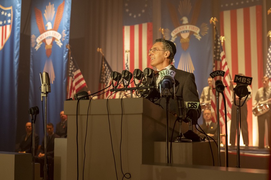 This image released by HBO shows John Turturro in a scene from &quot;The Plot Against America.&quot; The 6-part mini-series, based on the novel by the late Philip Roth, premieres Monday, March 16. (Mi ...