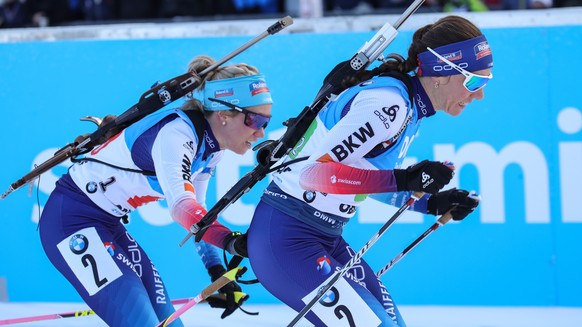 epa08120423 Selina Gasparin (R) and Elisa Gasparin (L) of Switzerland in action during the Women&#039;s 4x6 km relay race at the IBU Biathlon World Cup in Oberhof, Germany, 11 January 2020. EPA/ARMAND ...