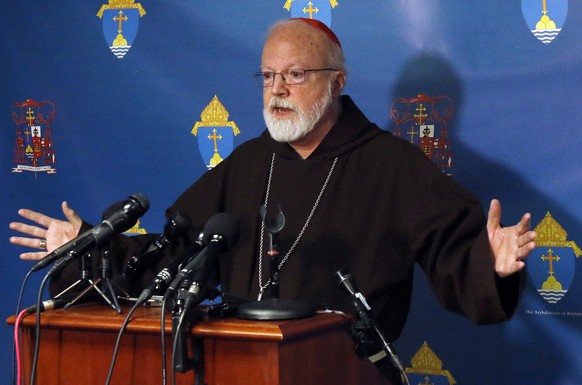 Boston Roman Catholic Archdiocese Cardinal Sean O&#039;Malley speaks to the media, Wednesday, Dec. 20, 2017, in Braintree, Mass., on the death of Cardinal Bernard Law. The disgraced former Boston arch ...
