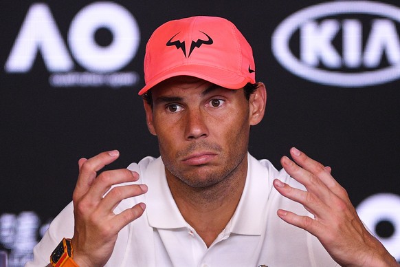 epa08366231 (FILE) Rafael Nadal of Spain reacts during a press conference after losing his quarter final match against Dominic Thiem of Austria at the Australian Open Grand Slam tennis tournament at R ...