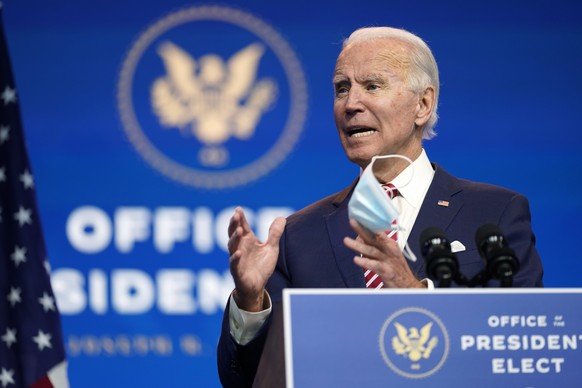 President-elect Joe Biden, accompanied by Vice President-elect Kamala Harris, speaks about economic recovery at The Queen theater, Monday, Nov. 16, 2020, in Wilmington, Del. (AP Photo/Andrew Harnik)
J ...