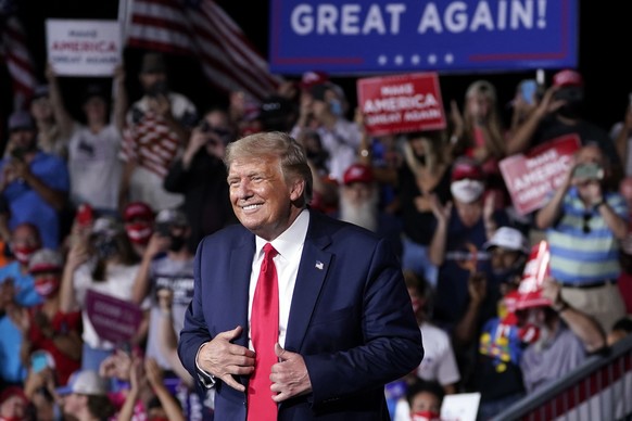 FILE - In this Sept. 8, 2020, file photo President Donald Trump stands on stage after speaking at a campaign rally at Smith Reynolds Airport in Winston-Salem, N.C. Senior aides describe North Carolina ...
