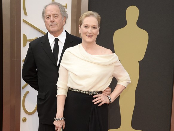 epa04107113 US actress Meryl Streep (R) and husband Don Gummer (L) arrive for the 86th annual Academy Awards ceremony at the Dolby Theatre in Hollywood, California, USA, 02 March 2014. The Oscars are  ...
