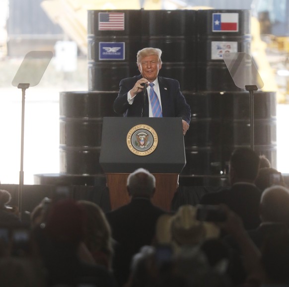 epa08573589 US President Donald J. Trump speaks at the Double Eagle Energy Rig in Midland, Texas, USA, 29 July 2020. Trump spoke on energy dominance and private investment in energy infastructure. Dou ...