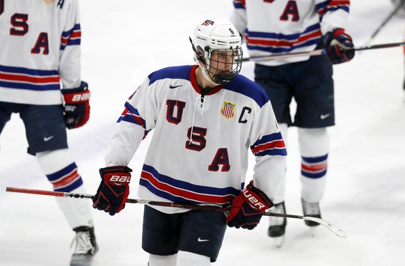 In this Wednesday, Nov. 21, 2018, photo, Jack Hughes, expected to be a top pick in the next NHL hockey draft, plays against Bowling Green in Plymouth, Mich. USA Hockey has developed the nation&#039;s  ...