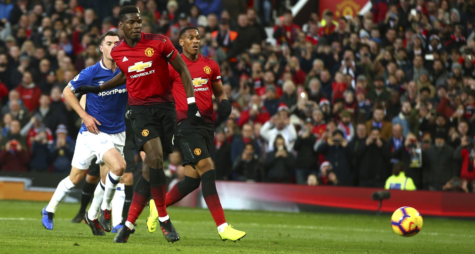 Manchester United&#039;s Paul Pogba scores the opening goal during the English Premier League soccer match between Manchester United and Everton FC at Old Trafford in Manchester, England, Sunday Oct.  ...