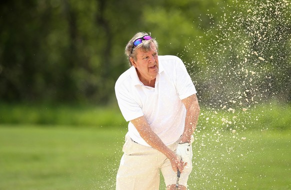 MALELANE, SOUTH AFRICA - NOVEMBER 26: Johann Rupert in action during a pro-am event ahead of the Alfred Dunhill Championship at Leopard Creek Country Golf Club on November 26, 2019 in Malelane, South  ...