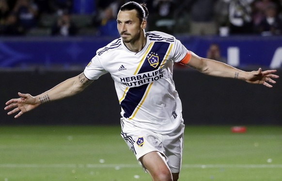 Los Angeles Galaxy forward Zlatan Ibrahimovic celebrates after scoring on a penalty kick during the second half of an MLS soccer match against the Portland Timbers, Sunday, March 31, 2019, in Carson,  ...