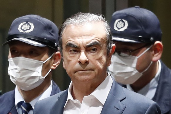 FILE - In this April 25, 2019, file photo, former Nissan Chairman Carlos Ghosn leaves Tokyo&#039;s Detention Center for bail in Tokyo. By jumping bail, Ghosn, who had long insisted on his innocence, h ...