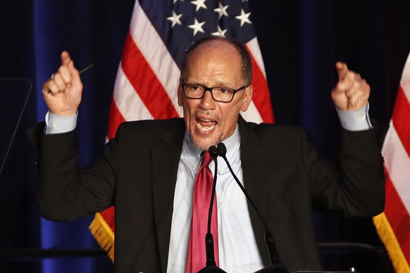 FILE - In this this Nov. 6, 2018, file photo, Tom Perez, Chairman of the Democratic National Committee, introduces Minority Leader Nancy Pelosi of Calif., as he speaks about Democratic wins in the Hou ...