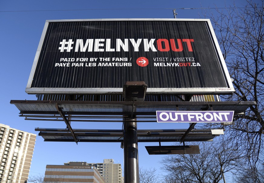 A billboard calling for Ottawa Senators owner Eugene Melnyk to sell the NHL hockey team is seen in Ottawa on Monday, March 19, 2018. (Justin Tang/The Canadian Press via AP)