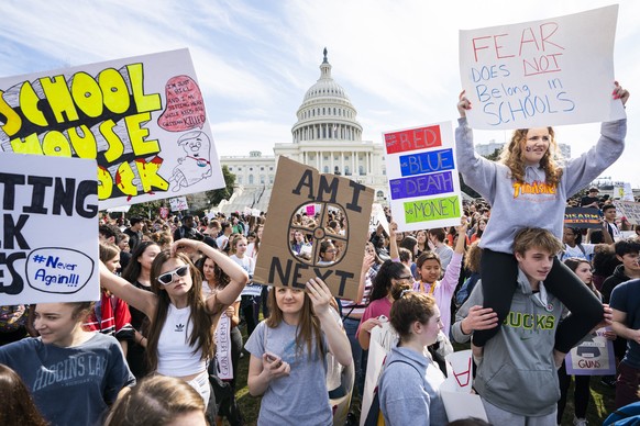 epa07436781 Several thousand of high school students from Montgomery County, Maryland who walked out of class march to the US Capitol and protest gun violence in Washington, DC, USA, 14 March 2019. Mo ...