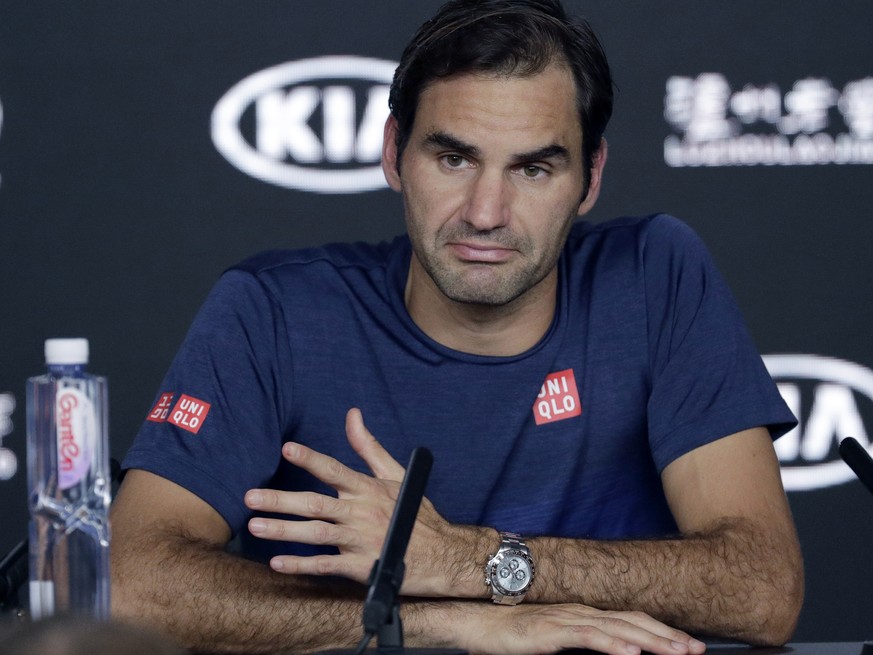 Switzerland&#039;s Roger Federer answers questions at a press conference following his fourth round loss to Greece&#039;s Stefanos Tsitsipas at the Australian Open tennis championships in Melbourne, A ...