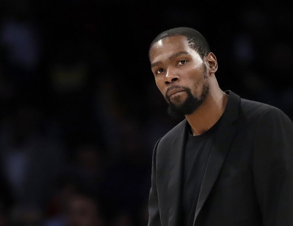 FILE- In this March 10, 2020, file photo, Brooklyn Nets&#039; Kevin Durant watches during the second half of the team&#039;s NBA basketball game against the Los Angeles Lakers in Los Angeles. Durant i ...