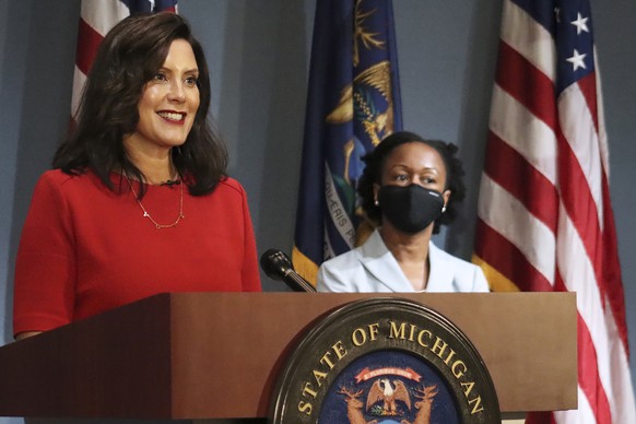 FILE - In this photo Sept. 16, 2020 file photo, provided by the Michigan Office of the Governor, Gov. Whitmer addresses the state during a speech in Lansing, Mich. According to a criminal complaint un ...