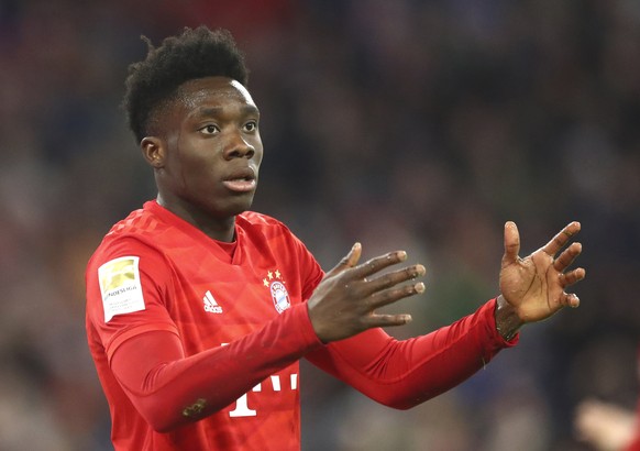 Bayern&#039;s Alphonso Davies reacts during the German Bundesliga soccer match between Bayern Munich and RB Leipzig at the Allianz Arena in Munich, Germany, Sunday, Feb. 9, 2020. (AP Photo/Matthias Sc ...