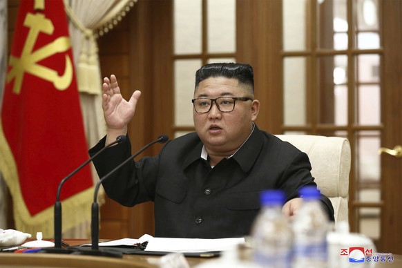 In this photo provided Wednesday, Sept. 30, 2020, by the North Korean government, North Korean leader Kim Jong Un attends the 18th meeting of Political Bureau of 7th Central Committee of the Workers&# ...