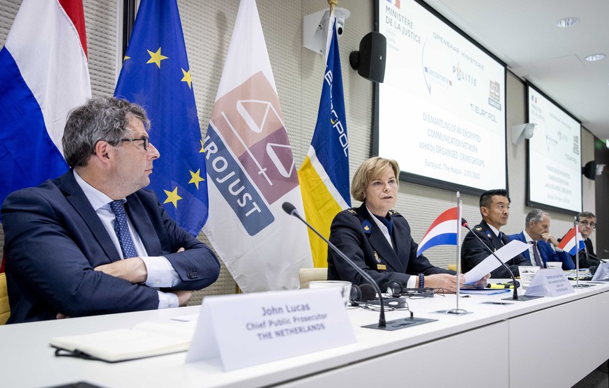 epa08522423 Dutch Chief Public Prosecutor John Lucas (L) and Police Chief of the National Unit Jannine van den Berg (2-L) during a press conference on the dismantling of an encrypted criminal communic ...