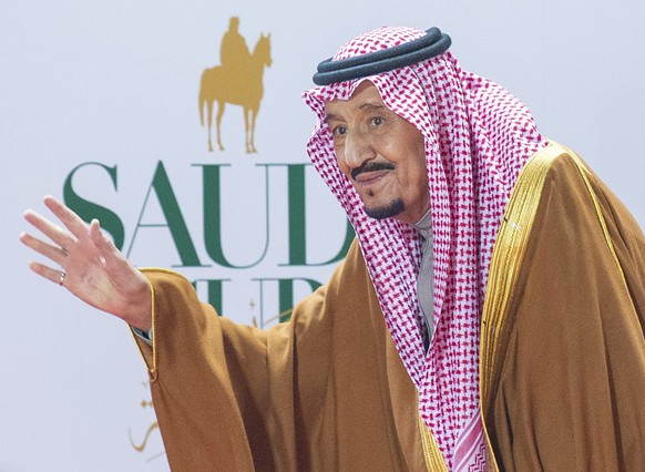 epa08260759 A Handout photograph made available by Saudi Royal Court shows Saudi King Salman bin Abdulaziz al Saud during the Inaugural Saudi Cup Horse Race at the King Abdulaziz Race Track, Riyadh, S ...