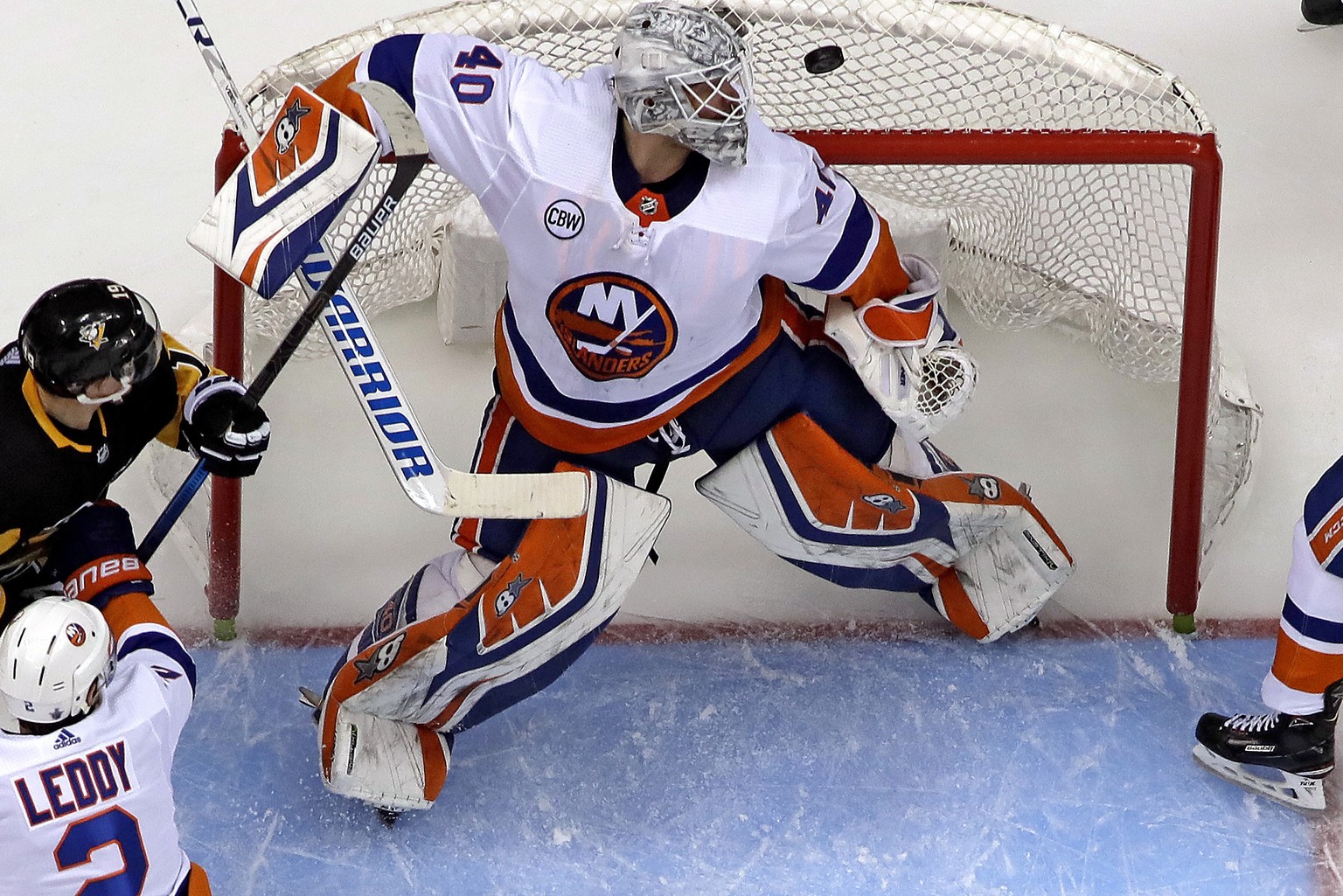 New York Islanders goaltender Robin Lehner (40) watches the puck during the second period in Game 3 of an NHL first-round hockey playoff series against the Pittsburgh Penguins in Pittsburgh, Sunday, A ...