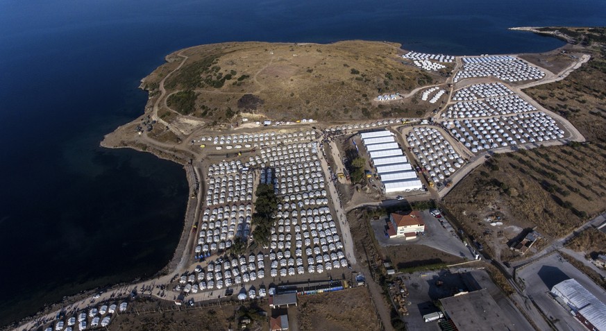 FILE - In this Thursday, Sept. 17, 2020, file photo, the new temporary refugee camp is seen from above on the northeastern island of Lesbos, Greece. The anti-torture committee of the Council of Europe ...