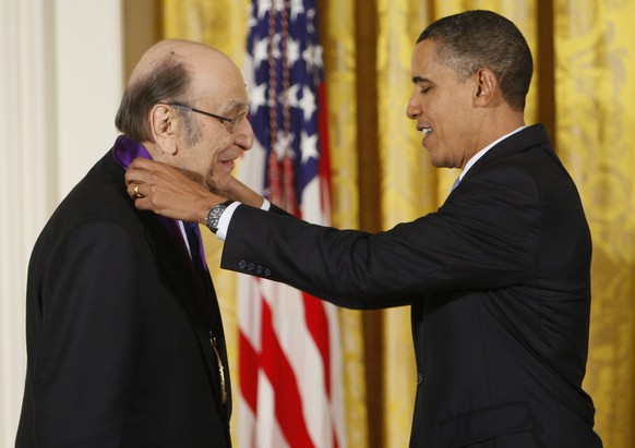 FILE - In this Thursday, Feb. 25, 2010, file photo, President Barack Obama presents a 2009 National Medal of Arts to Milton Glaser, in the East Room of the White House in Washington. Glaser, the desig ...
