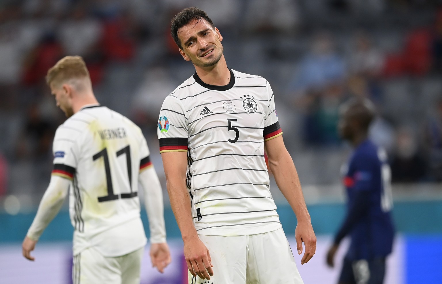 epa09274816 Mats Hummels of Germany reacts during the UEFA EURO 2020 group F preliminary round soccer match between France and Germany in Munich, Germany, 15 June 2021. EPA/Matthias Hangst / POOL (RES ...