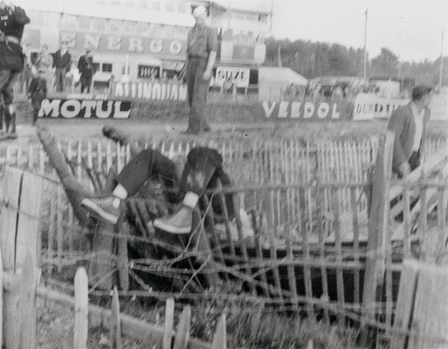 This was one of the many scenes of stark tragedy at the Le Mans, France race track June 11, 1955, after a Mercedes sports car driven by Pierre Levegh collided with another racing car and then exploded ...