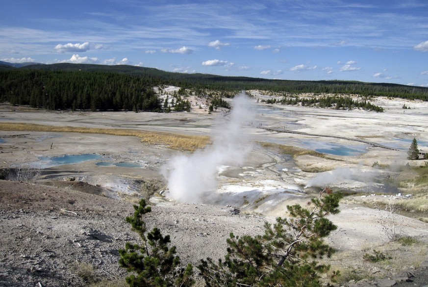 FILE - This September, 2009 file photo shows the Norris Geyser Basin in Yellowstone National Park, Wyo. Rangers are navigating a dangerous landscape where boiling water flows beneath a fragile rock cr ...