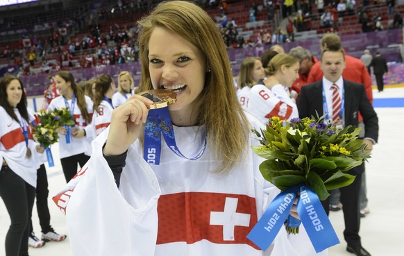 Switzerland&#039;s ice hockey women goalkeeper Florence Schelling celebrates her bronze medal during the women&#039;s ice hockey victory ceremony at the XXII Winter Olympics 2014 Sochi, at the Bolshoy ...