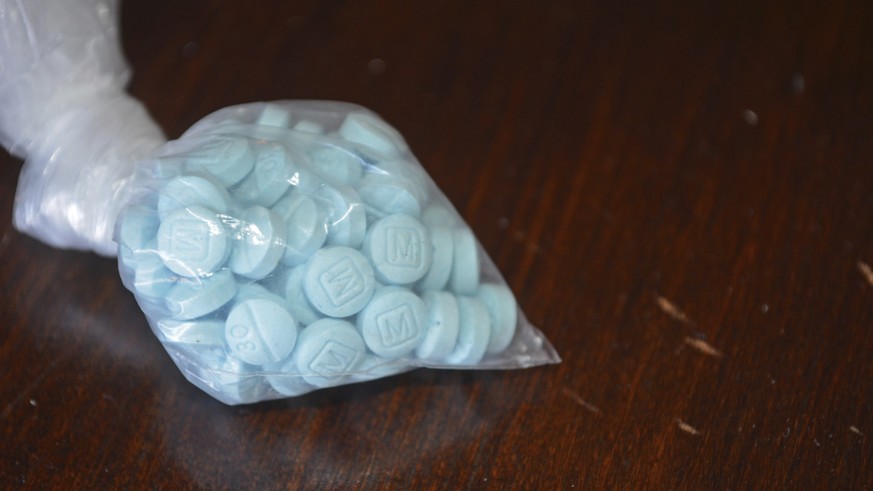 This undated photo provided by the U.S. Drug Enforcement Administration&#039;s Phoenix Division shows a closeup of the fentanyl-laced sky blue pills known on the street as &quot;Mexican oxy.&quot; Smu ...